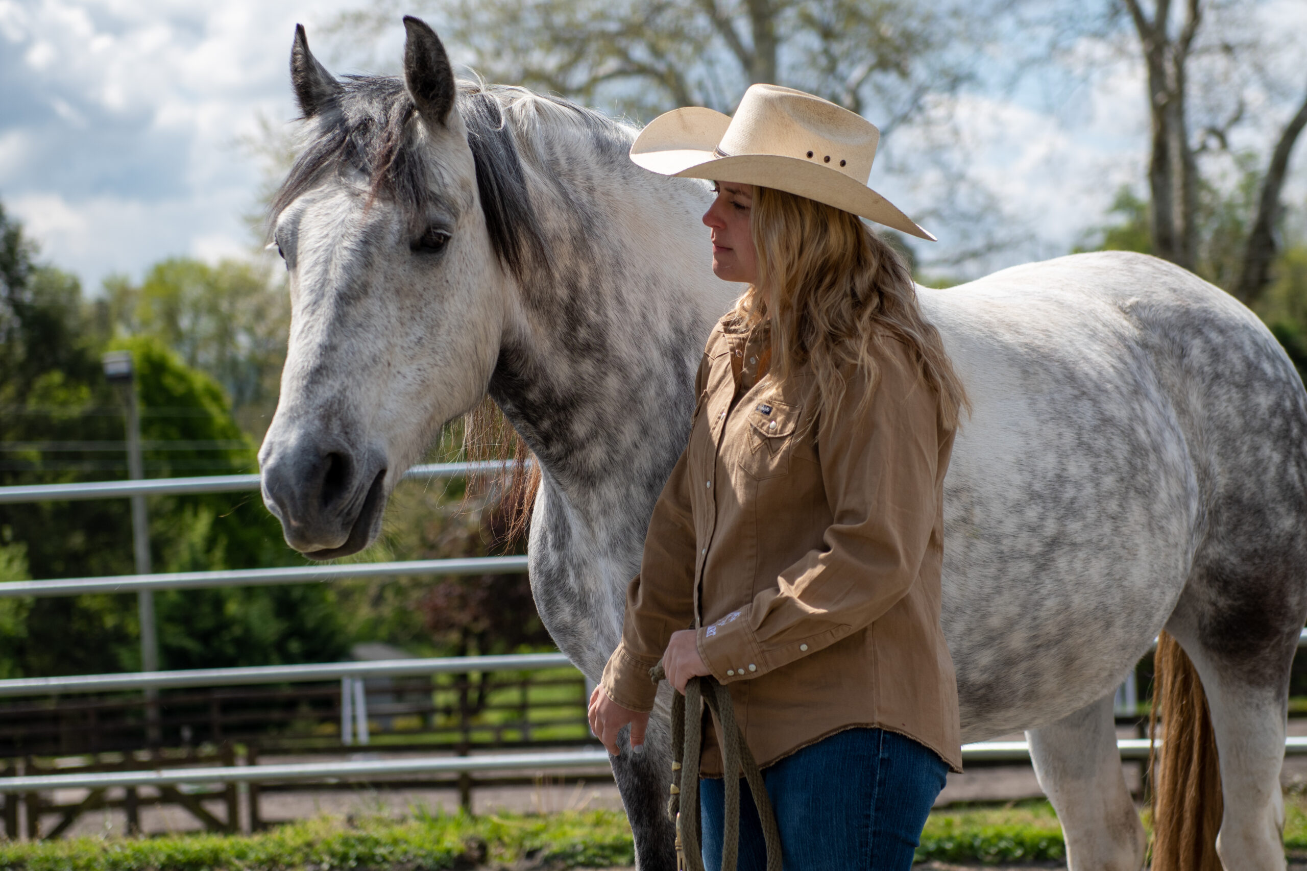 Young girl finding comfort with horse during grief over the holidays